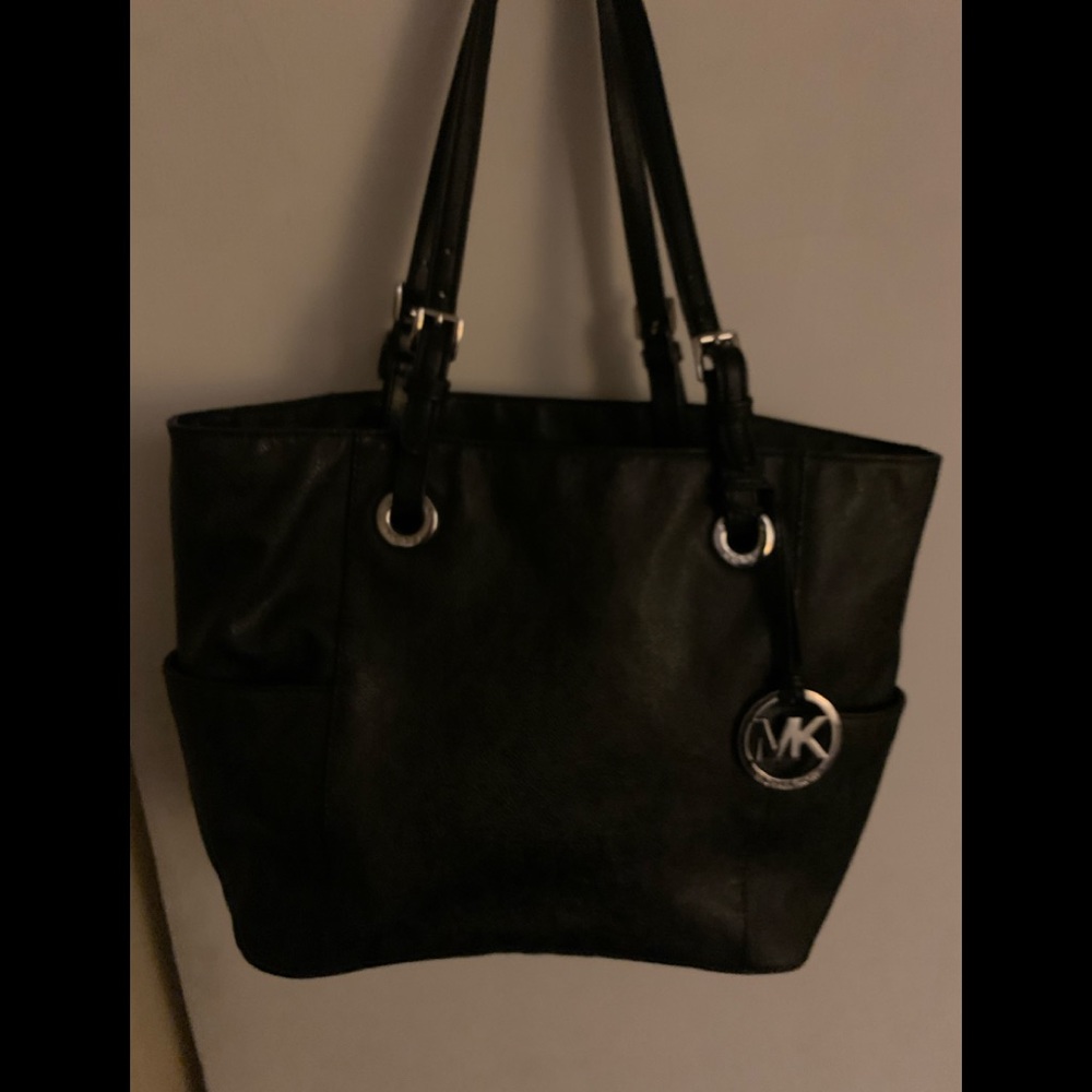 Michael Kors tote black with gray letters authentic has some wear on straps
